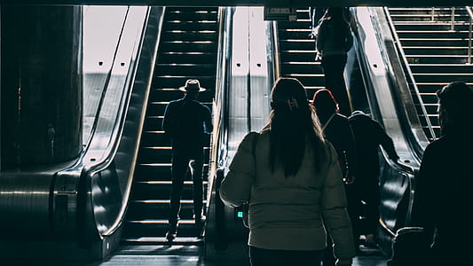 Man in Hat at Escalator thumbnail