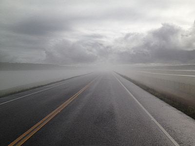 gray empty asphalt road covered with fogs thumbnail