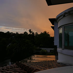 high-angle photography of house near trees thumbnail