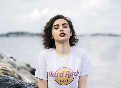 photo of woman wearing white scoop-neck top thumbnail