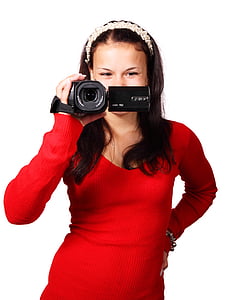 woman wearing red long-sleeved shirt holding camcorder thumbnail