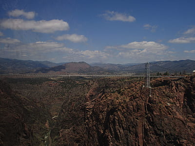 hanging bridge between rock cliffs thumbnail