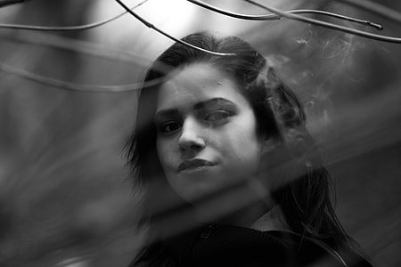 gray scale photo of woman in black shirt thumbnail