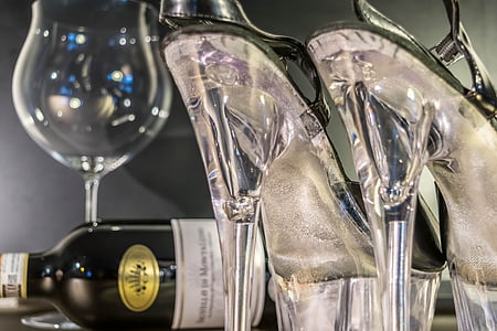 wine bottle and clear stilettos thumbnail