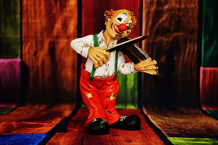 clown playing violin ceramic figurine thumbnail