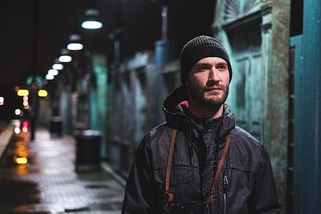 man walking on pathway wearing jacket thumbnail