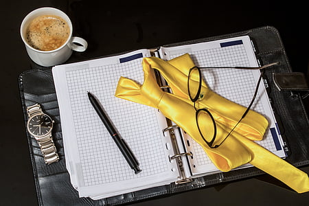 eyeglasses on white graphing notebook thumbnail