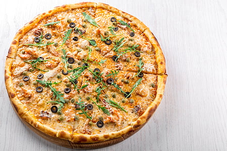 pizza with herbs on top thumbnail