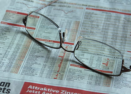 eyeglasses on top of white printer paper thumbnail