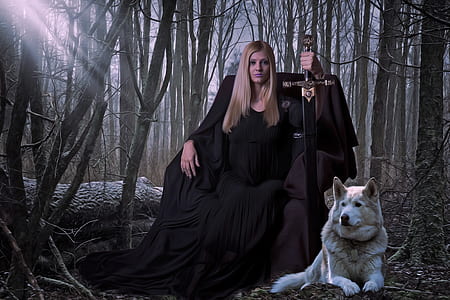 woman wearing black dress holding sword sitting beside white Siberian husky dog thumbnail