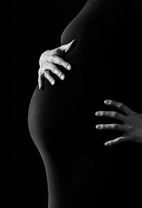 Gray Scale Photo of a Pregnant Woman thumbnail