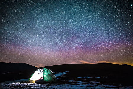 green and white tent under star sky thumbnail