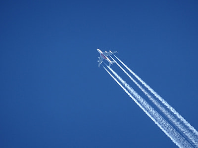jet plane under blue sky thumbnail
