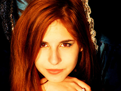 smiling woman with red hair thumbnail