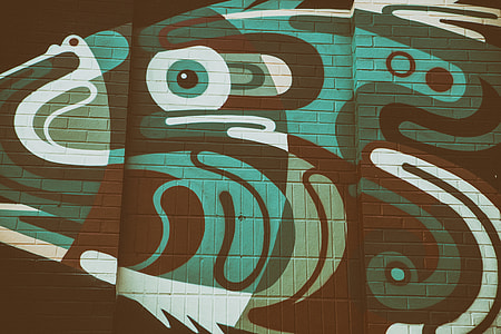 Street art captured on a brick wall in Shoreditch thumbnail