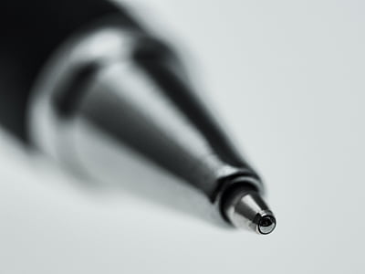 selective focus photography of pen tip thumbnail