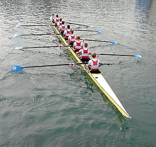 group of people paddling canoe thumbnail