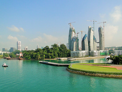 buildings beside trees thumbnail