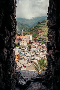 cave overlooking buildings thumbnail