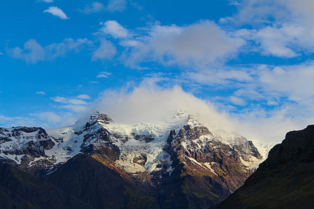 snowy mountain under white clouds thumbnail