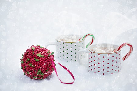 two white-and-red polka-dot mugs filled with marshmallows thumbnail