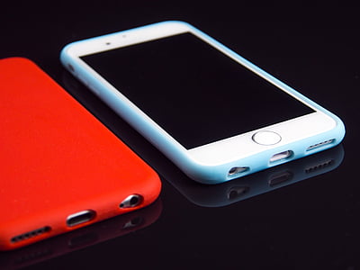 iPhone with teal case thumbnail