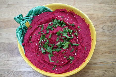 red cream on yellow bowl thumbnail