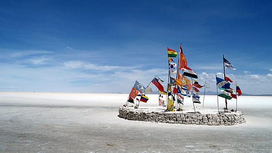 assorted flags under blue sky thumbnail