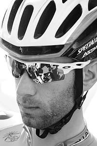 man in white and black bicycle thumbnail