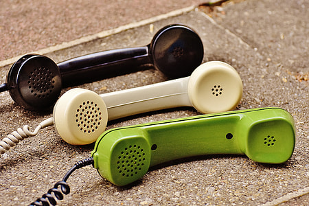 Green, black, and white phones thumbnail