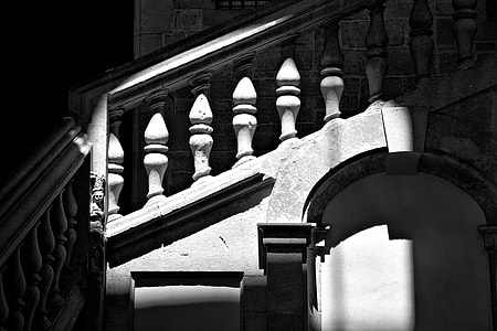 An image of an shadow-lit stone staircase, image captured in the Gothic Quarter, Barcelona thumbnail