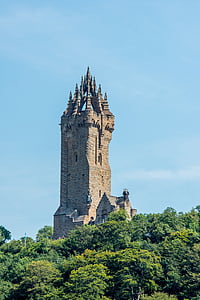 gray concrete castle near green trees at daytime thumbnail