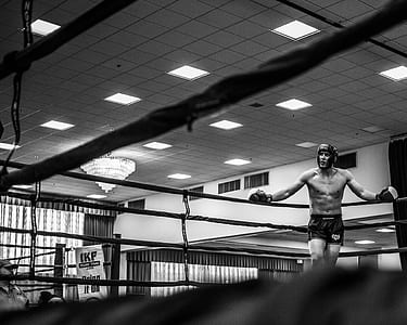 man standing beside ring corner thumbnail