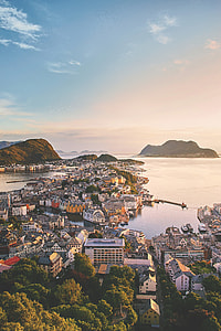 top view shot of buildings near body of water thumbnail