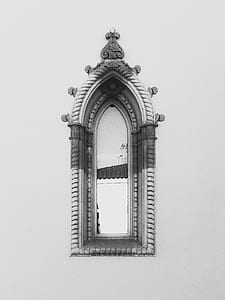 gray and white ornate window thumbnail