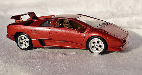 red coupe scale model thumbnail