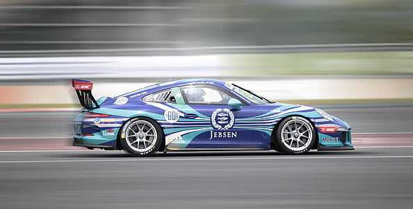 selective focus photography of blue, white, and teal Jebsen-printed coupe thumbnail
