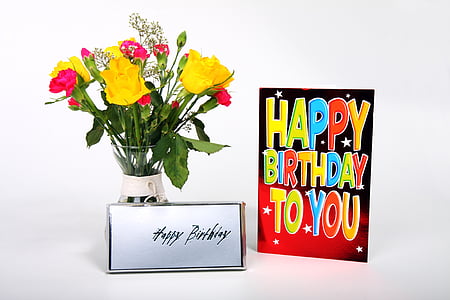 yellow, green, and red flower arrangement beside birthday greeting card thumbnail