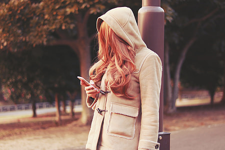blonde hair woman wearing gray hoodie jackety thumbnail