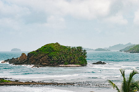 green islet view during daytime thumbnail