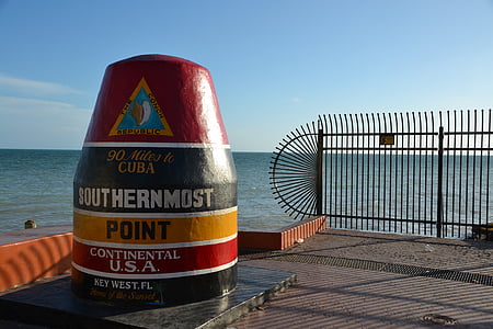 steel fence near ocean thumbnail
