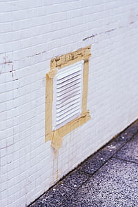 white vent on tiled wall thumbnail