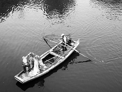 grayscale photography of two fishermen on boat thumbnail