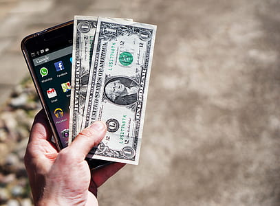 person holding black Android smartphone thumbnail