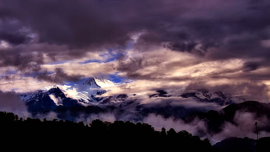 snowy mountain under white clouds thumbnail