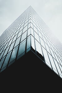 low angle photography of high rise curtain building during daytime thumbnail