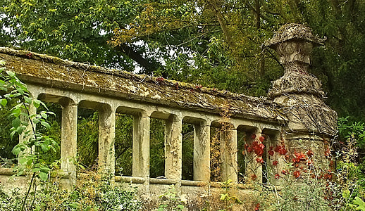 brown concrete ruin near tree at daytime thumbnail