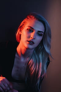 red light on woman's face thumbnail