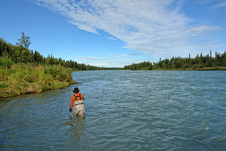 man walking on body of water at daytime thumbnail