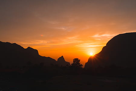 silhouette of mountain during sunrise thumbnail